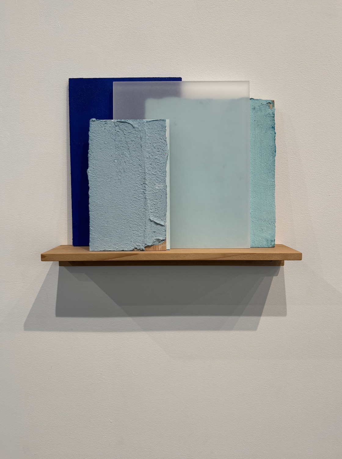 SHELF WITH BLUES, 2025 by Alan Greenberg
